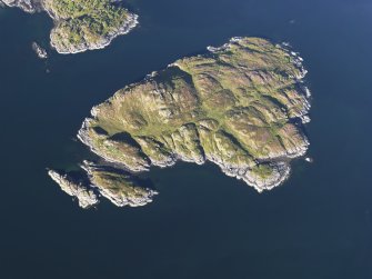 Oblique aerial view of Risga, looking NE.