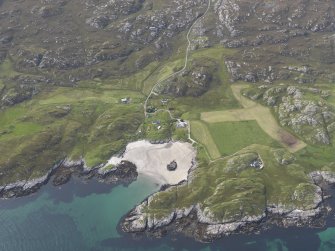 Oblique aerial view of Sorisdale Bay, Coll, looking to the W.