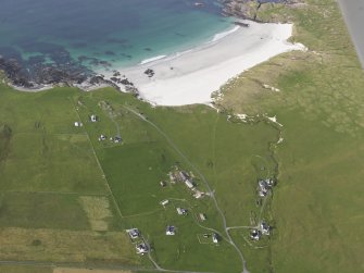Oblique aerial view of Balevullin and Traigh Baile a' Mhuilian Tiree, looking to the NNW.