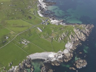 Oblique aerial view of Hynish, Tiree, looking to the NNE.