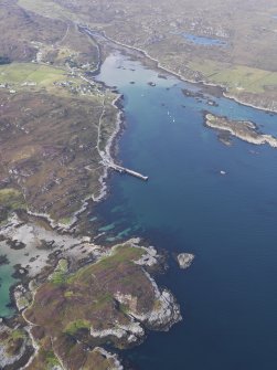 General olique aerial view of the bay at Aringour with Eilean Ornsay in the foreground, looking to the NNE.