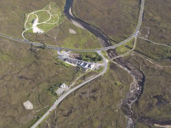Oblique aerial view centred on the Sligachan Hotel, looking NE.