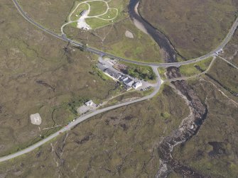 Oblique aerial view centred on the Sligachan Hotel, looking NNE.
