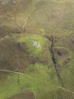 Oblique aerial view of Dun Gearymore, looking E.