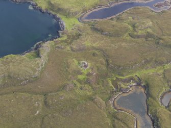 Oblique aerial view of Dun Fiadhairt, looking NE.