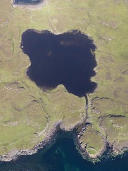 Oblique aerial view centred on Loch na h-Airde, the 'Viking Canal’ and the remains of the dun at Rubh' an Dunain, taken from the S.