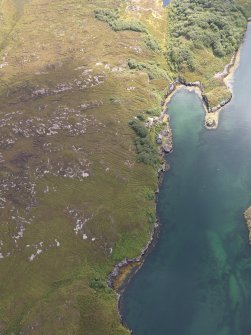 Oblique aerial view of the Soay shark factory, looking SE.