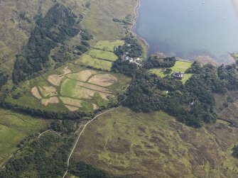 General oblique aerial view of Loch Scresort and Kinloch Castle, Rum, looking E.