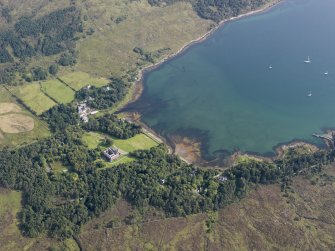Oblique aerial view of Loch Scresort and Kinloch Castle, Rum, looking ENE.