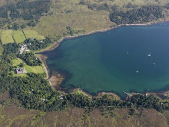 Oblique aerial view of Loch Scresort and Kinloch Castle, Rum, looking NNE.