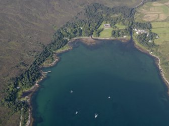 Oblique aerial view of Loch Scresort and Kinloch Castle, Rum, looking W.