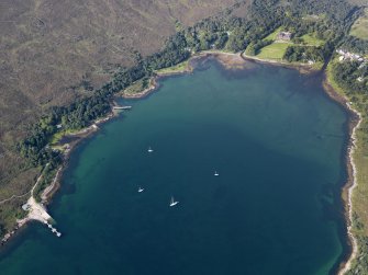 Oblique aerial view of Loch Scresort and Kinloch Castle, Rum, looking WSW.