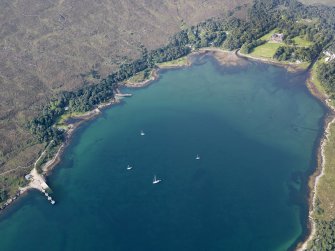 Oblique aerial view of Loch Scresort and Kinloch Castle, Rum, looking WSW.