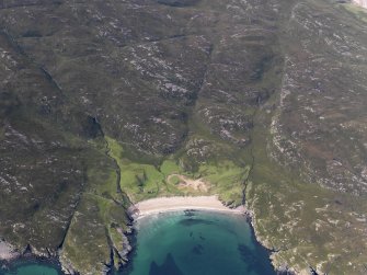 Oblique aerial view of the buildings at Samhnan Insir, Rum, looking SW.