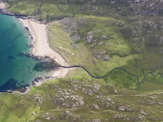 Oblique aerial view of Kilmory, Rum, looking E.