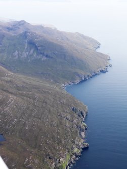 General oblique aerial view of the coast of Rum at Sgorr Mor, looking NE.