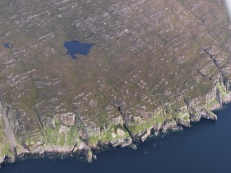 General oblique aerial view of the coast of Rum at Sgorr Mor, looking NNE.