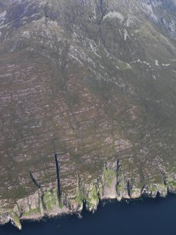 General oblique aerial view of the coast of Rum at Sgorr Mor, looking NNW.