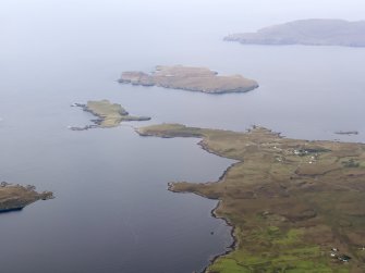 General oblique aerial view of Loch Bracadale with Oronsay and Wiay in the middle distance, looking W.