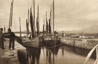 Copy of photograph titled 'Fishing boats on the Caledonian Canal at Banavie'