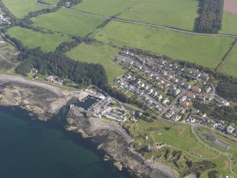 General oblique aerial view of Dunure with the castle in the foreground, taken from the W.