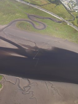 Oblique aerial view of the fish trap stakes of Scaur Fishery on the River Cree, taken from the SW.