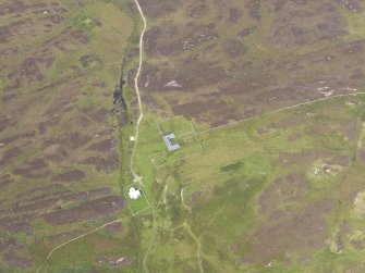 Oblique aerial view of Balerominmore House and the adjacent chapel and burial ground, taken from the S.