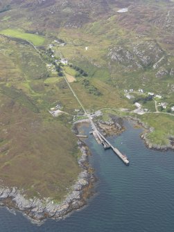 General oblique aerial view of Scalasaig and the pier at Port an Obain, taken from the WSW,