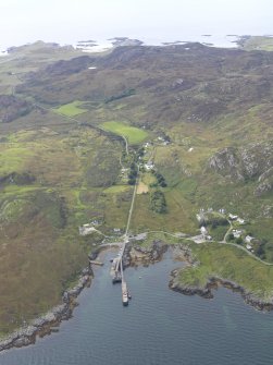 General oblique aerial view of Scalasaig and the pier at Port an Obain, taken from the WNW.