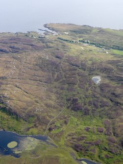 General oblique aerial view of Scalsaig and Bein nan Gudairean viewed from Loch Fada, taken from the NW.