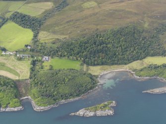 Oblique aerial view of Ardlussa and Port nam Meirleach, Jura, taken from the SE.