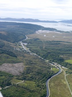 Oblique aerial view looking along the Crinan Canal, taken from the SE.