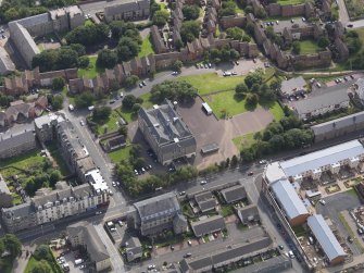 Oblique aerial view of the school, taken from the NNE.