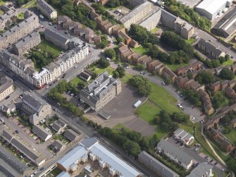 Oblique aerial view of the school, taken from the NW.