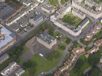 Oblique aerial view of the school, taken from the SW.