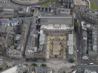 General oblique aerial view of the City Square area, centred on the Caird Hall taken from the NNW.