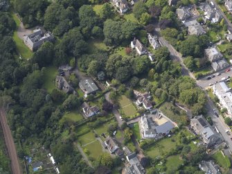 Oblique aerial view of the houses off the Perth Road taken from the SE.