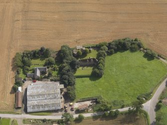 Oblique aerial view of the castle and farmhouse taken from the N.