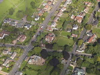 General oblique aerial view of Red Court centred on the house taken from the WSW.