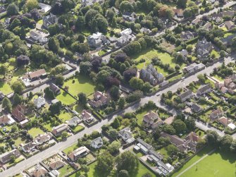 General oblique aerial view of Red Court centred on the house taken from the NNE.