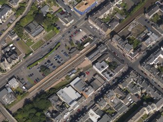 Oblique aerial view of the railway station taken from the SW.