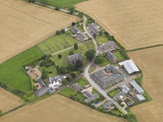 General oblique aerial view of Kirton of Tealing centred on the church taken from the NNE.