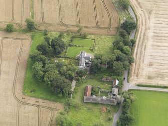 General oblique aerial view of South Balluderon Farm centred on the house, taken from the NNW.