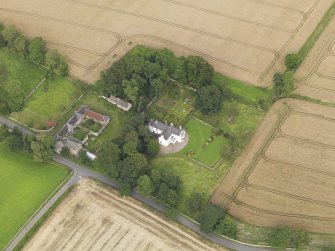 General oblique aerial view of South Balluderon Farm centred on the house, taken from the W.