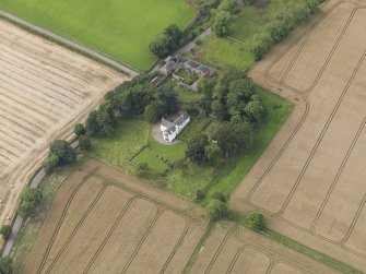 General oblique aerial view of South Balluderon Farm centred on the house, taken from the SE.