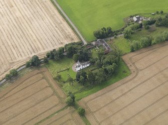 General oblique aerial view of South Balluderon Farm centred on the house, taken from the E.