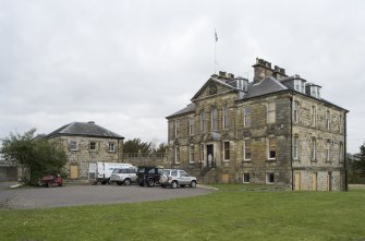 General view of Cumbernauld House, Cumbernauld, taken from the South. The main house and the East elevation of the Eastern Pavilion can be seen.
