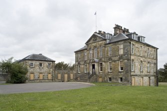 General view of Cumbernauld House, Cumbernauld, taken from the South. The photograph shows the main house, linking corridor and the Eastern Pavilion.
