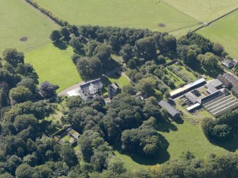 General oblique aerial view of the Affleck Estate, centred on the castle, taken from the E.