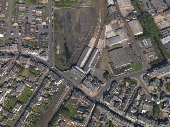 General oblique aerial view of central Arbroath, centred on the railway station, taken from the SSE.